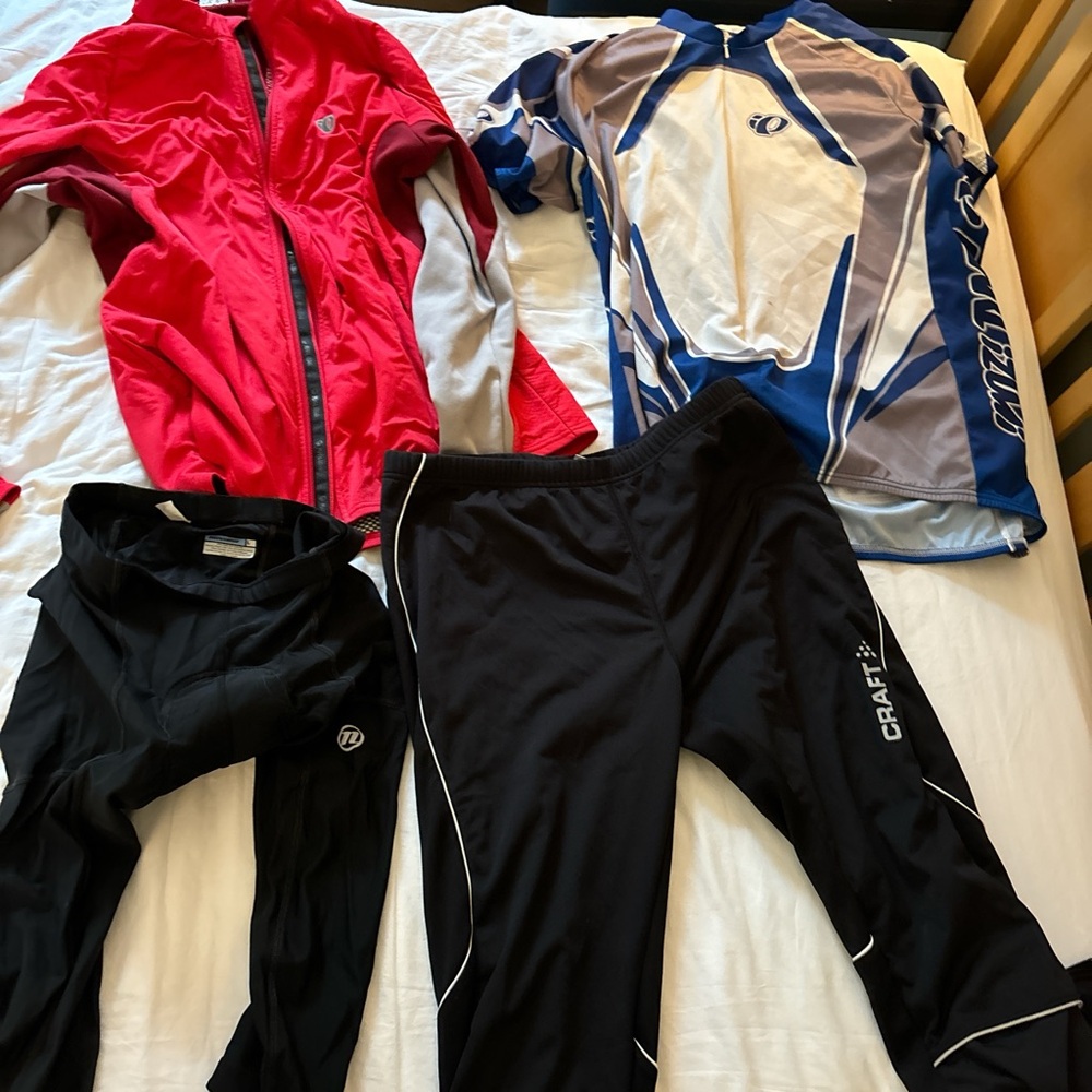 Bundle of 4 cycling outfits - 2 jackets 2 bottoms. Tops XL Bottoms L